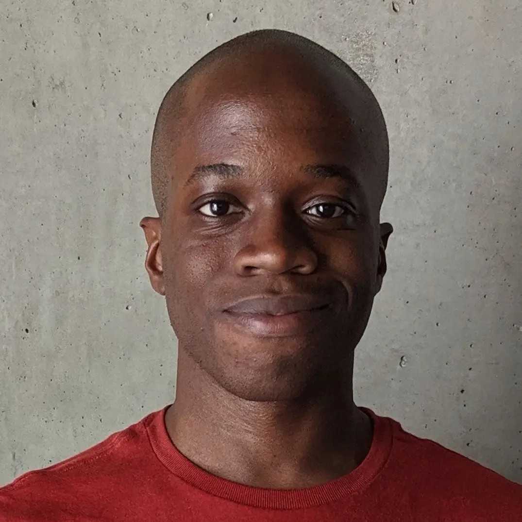Agya K. Aning, The Trace's inaugural editing fellow, faces directly toward the camera in this headshot.